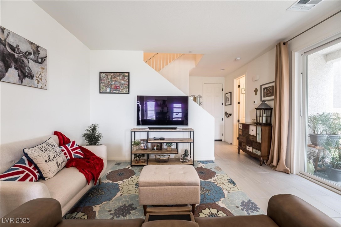 128 Kimberlite Drive Henderson, NV 89011 - Photo 8 of 55 Living room featuring baseboards