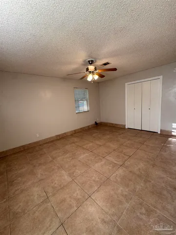 a view of a livingroom with a fan