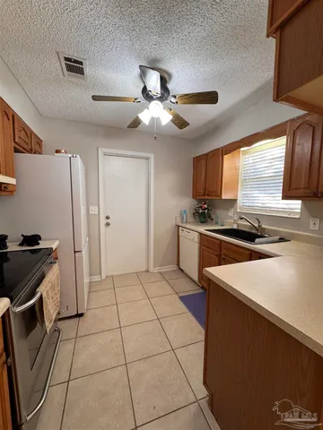 a view of a livingroom and a fireplace