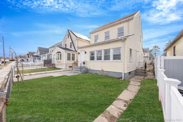 a house view with a garden space