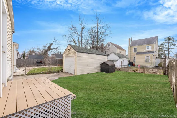 a view of a backyard of the house