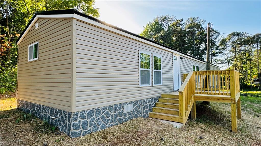 36 Garden Ridge Drive Carrollton, GA 30116 - Photo 1 of 1 a view of a house with a yard