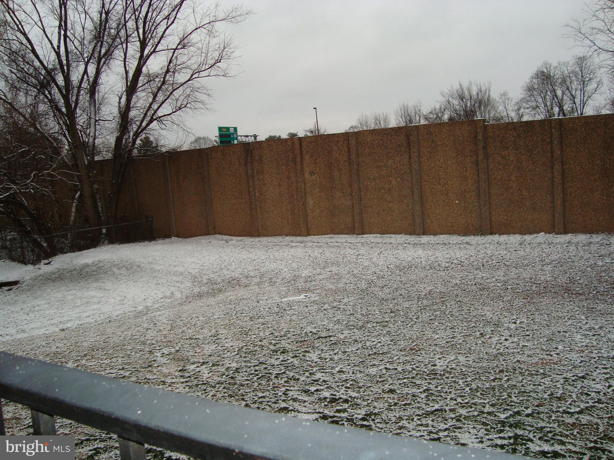 102 Duvall Lane, Unit 6202 Gaithersburg, MD 20877 - Photo 22 of 23 a view of wooden fence
