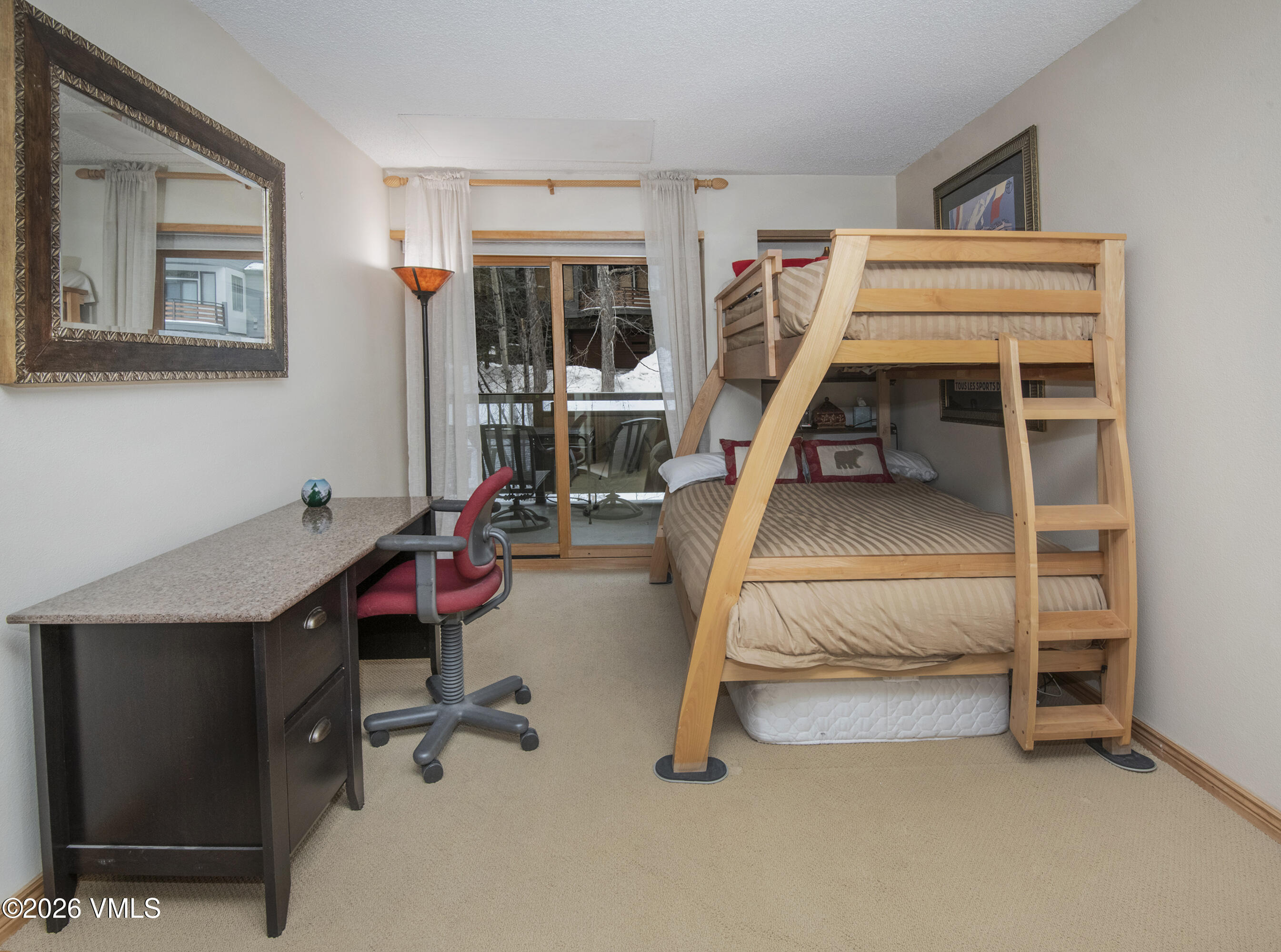 1650 Fall Ridge Road, Unit 202 Vail, CO 81657 - Photo 12 of 32 a bedroom with furniture and a wooden floor