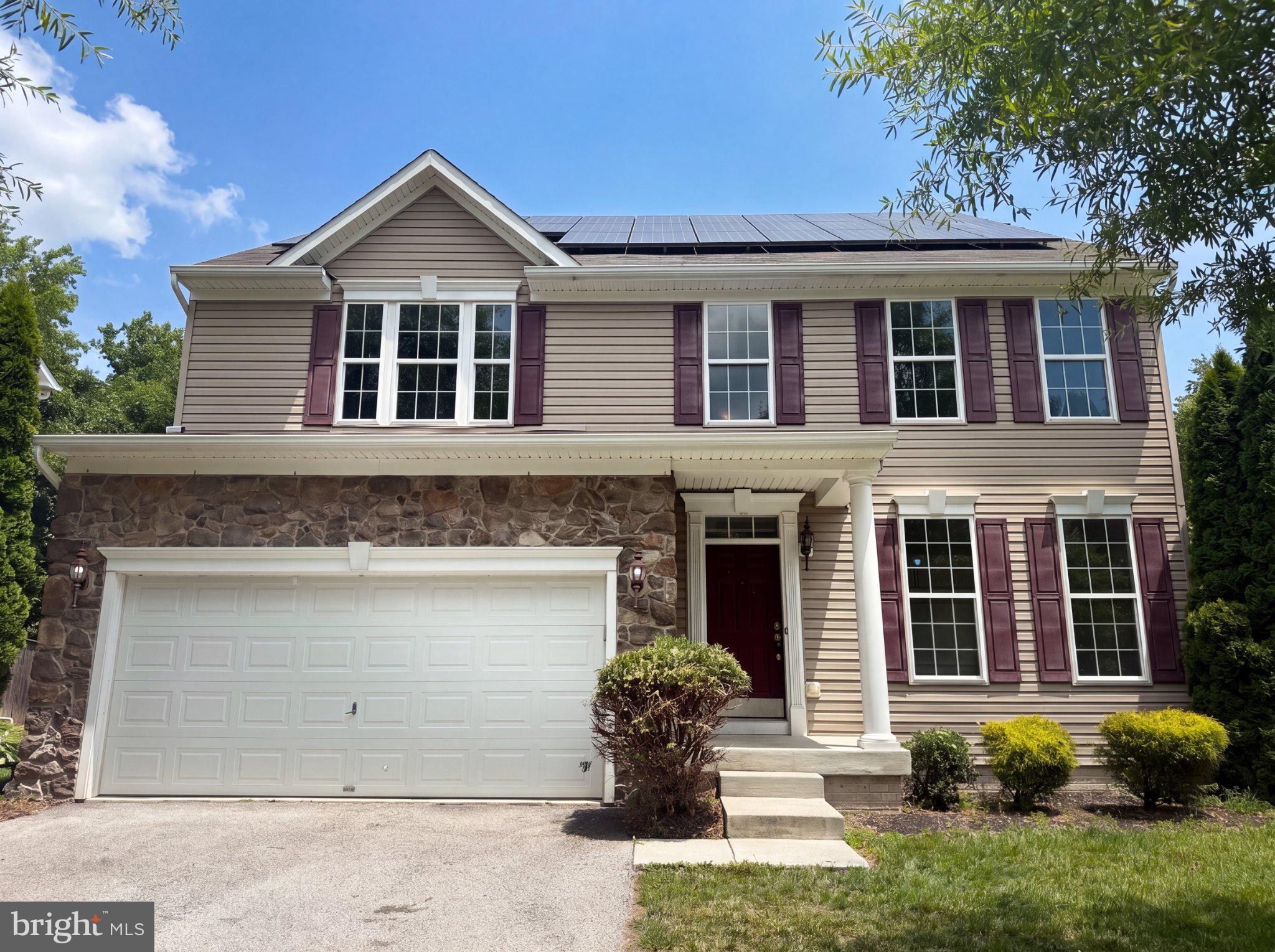Charming home with solar panels.