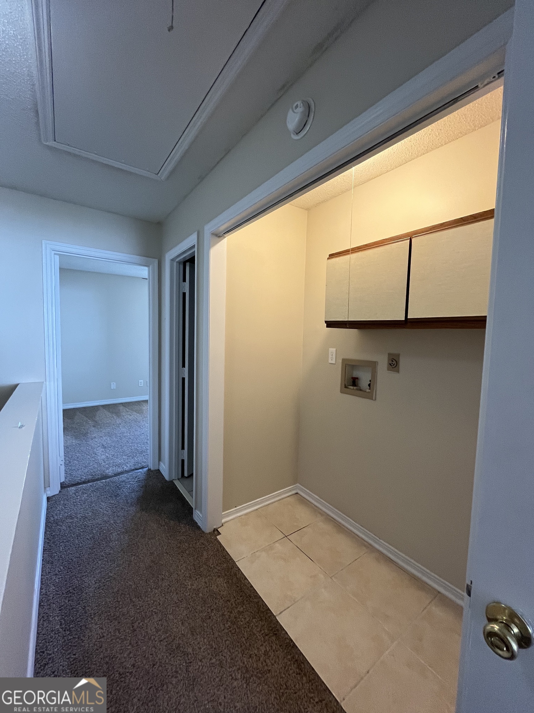 109 Inlet Reach Circle St. Marys, GA 31558 - Photo 13 of 16 a view of storage and utility room with a window