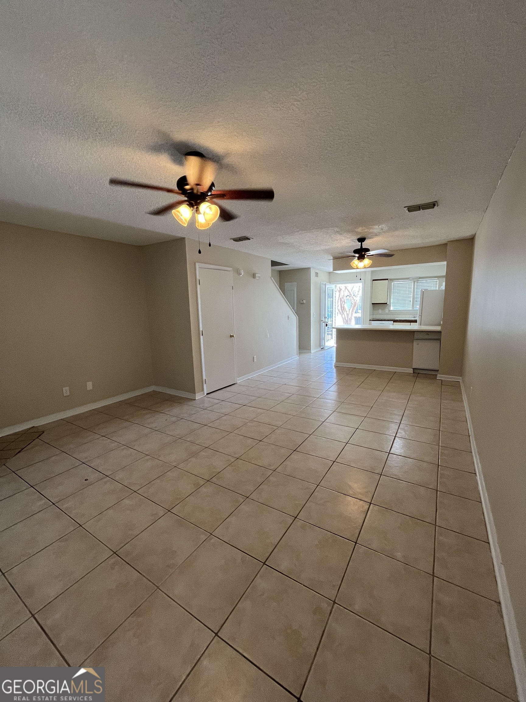 109 Inlet Reach Circle St. Marys, GA 31558 - Photo 6 of 16 a view of an empty room and chandelier fan