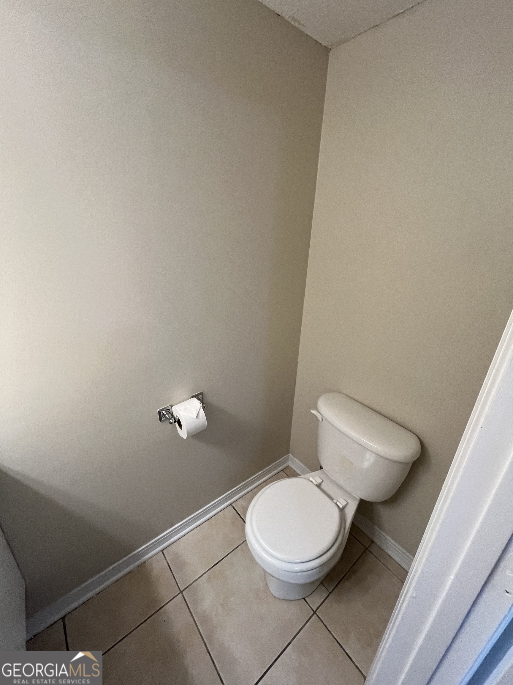 109 Inlet Reach Circle St. Marys, GA 31558 - Photo 10 of 16 a white toilet sitting next to a white wall