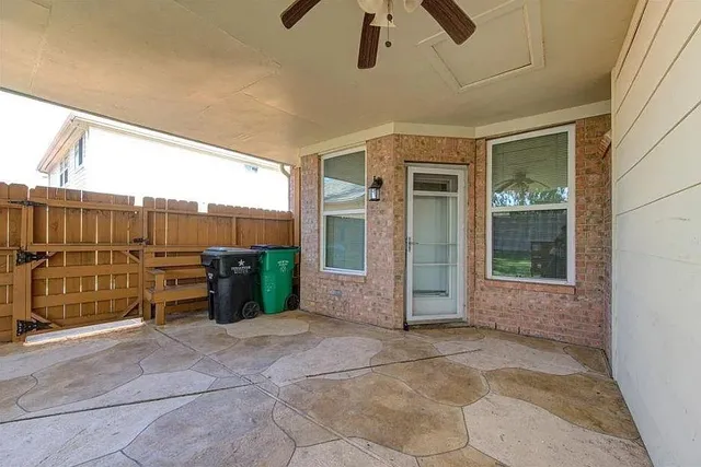 a view of a porch with furniture