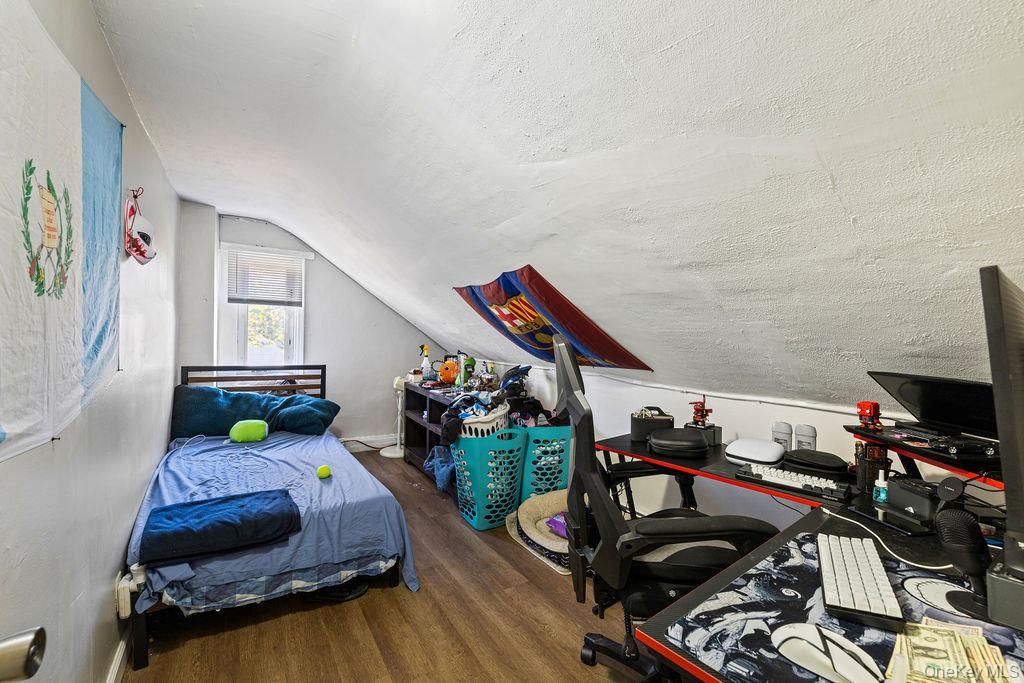 309 Gate Hill Coop Road Stony Point, NY 10980 - Photo 13 of 23 a bedroom with furniture and a wooden floor