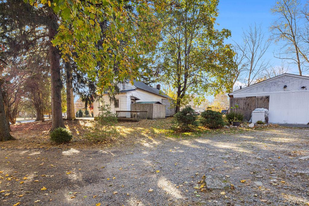 309 Gate Hill Coop Road Stony Point, NY 10980 - Photo 22 of 23 a view of a house with a yard covered in snow