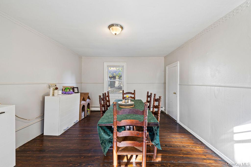 309 Gate Hill Coop Road Stony Point, NY 10980 - Photo 7 of 23 a view of a dining room with furniture and wooden floor
