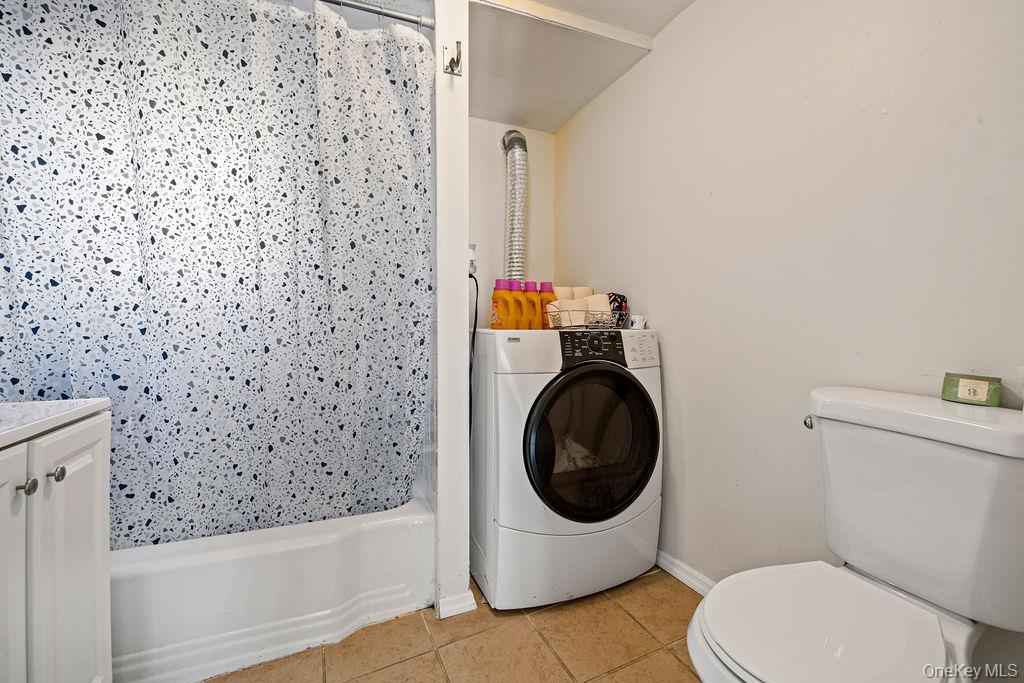 309 Gate Hill Coop Road Stony Point, NY 10980 - Photo 10 of 23 a bathroom with a toilet and a sink