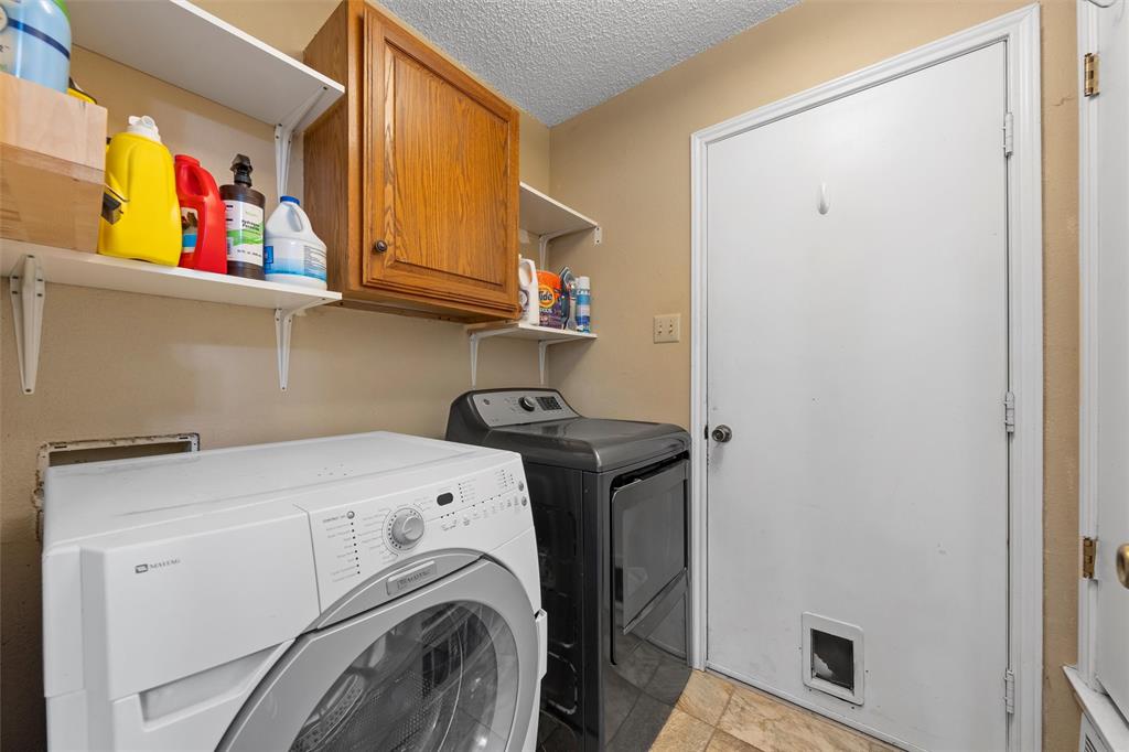 1010 December Drive Hewitt, TX 76643 - Photo 13 of 25 a utility room with dryer and washer