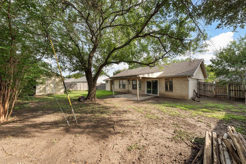 1010 December Drive Hewitt, TX 76643 - Photo 21 of 25 a view of a house with a yard
