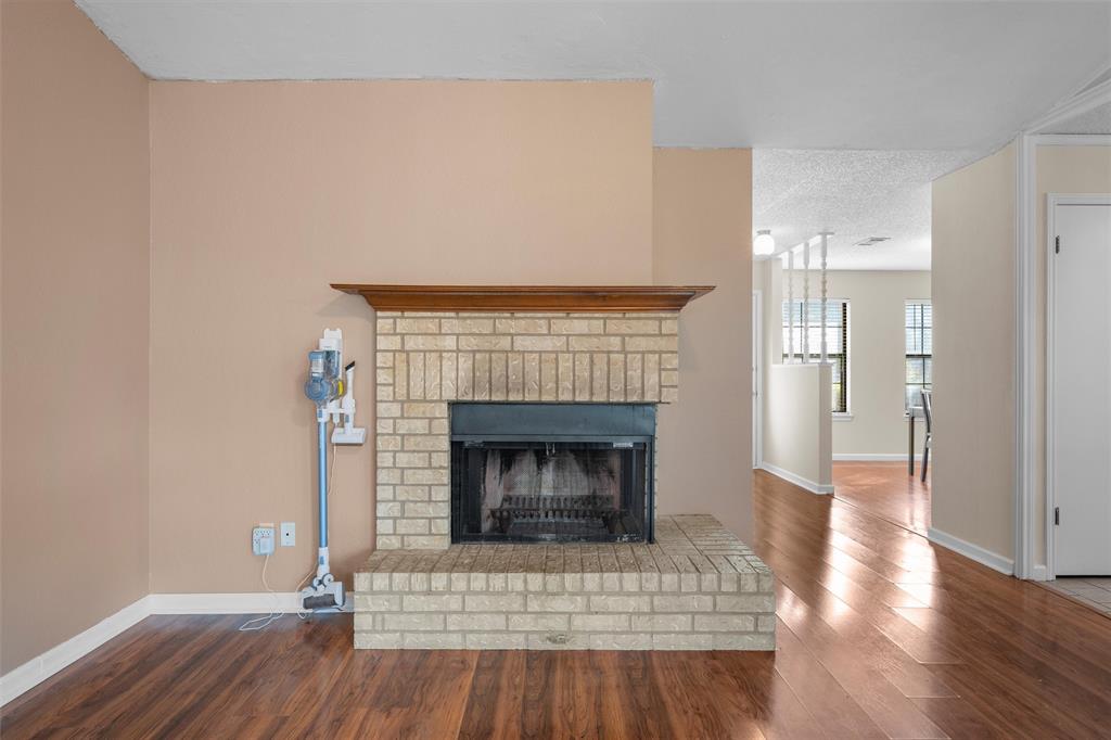 1010 December Drive Hewitt, TX 76643 - Photo 9 of 25 a living room with a fireplace