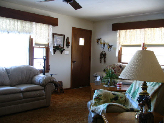 11703 West Brandherm Road Beloit, WI 53511 - Photo 3 of 6 a living room with furniture and a window