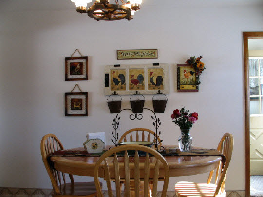 11703 West Brandherm Road Beloit, WI 53511 - Photo 6 of 6 a view of a dining room with furniture and wooden floor