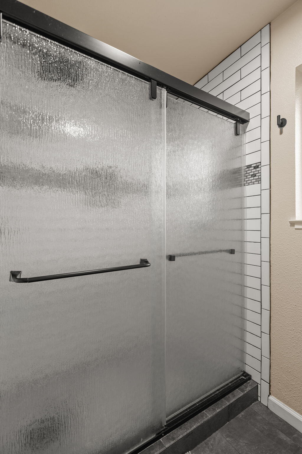 18260 Racoon Drive Lakehead, CA 96051 - Photo 12 of 23 a bathroom with a glass shower door
