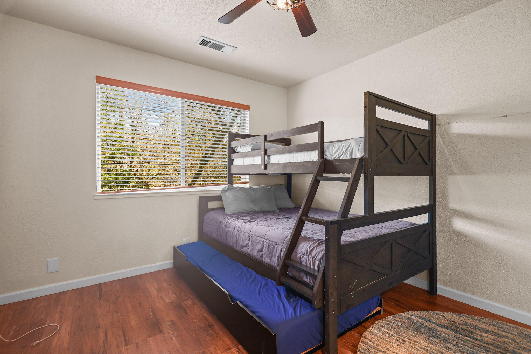 18260 Racoon Drive Lakehead, CA 96051 - Photo 14 of 23 a bedroom with furniture and a window