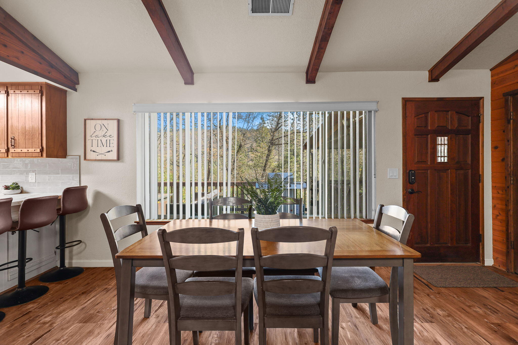 18260 Racoon Drive Lakehead, CA 96051 - Photo 9 of 23 a view of a dining room with furniture and wooden floor