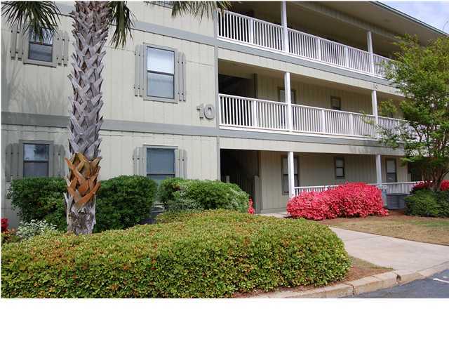 3799 East A Santa Rosa Beach, Unit 10G C30 Santa Rosa Beach, FL 32459 - Photo 1 of 13 a view of a brick house with a yard
