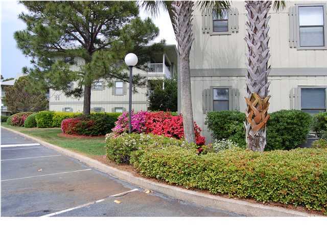 3799 East A Santa Rosa Beach, Unit 10G C30 Santa Rosa Beach, FL 32459 - Photo 2 of 13 a view of a garden with flowers and plants