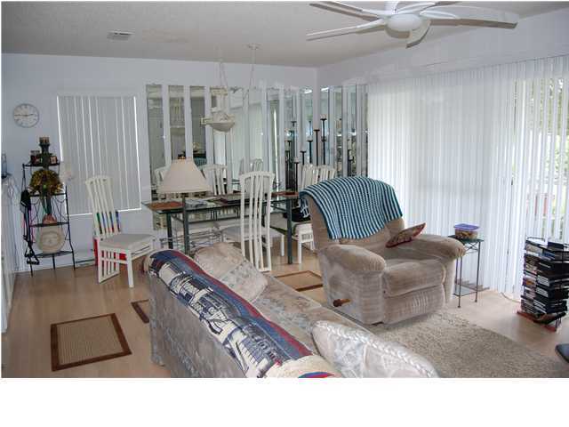 3799 East A Santa Rosa Beach, Unit 10G C30 Santa Rosa Beach, FL 32459 - Photo 5 of 13 a living room with furniture and wooden floor