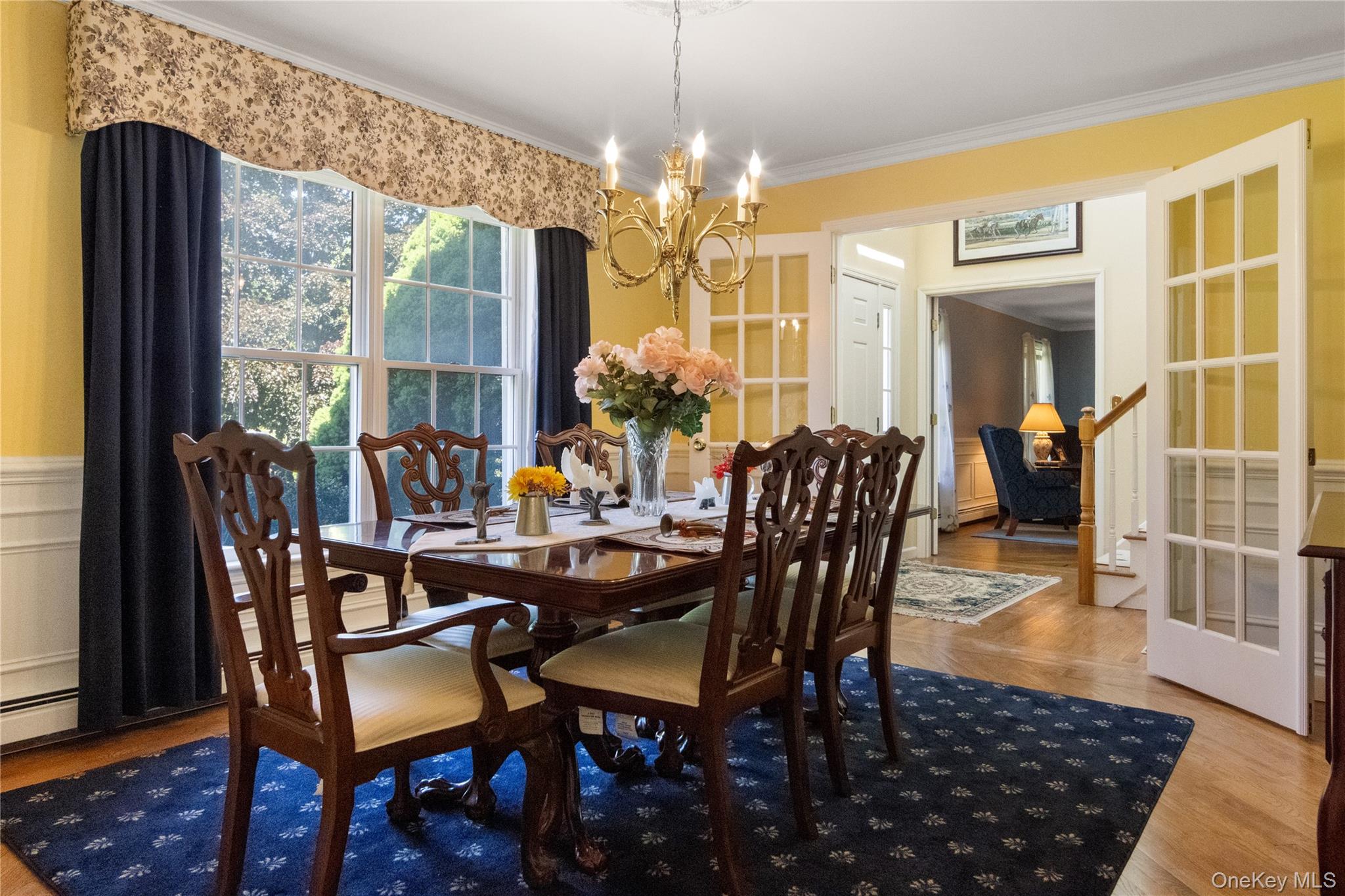 214 West Mombasha Road Monroe, NY 10950 - Photo 10 of 43 a view of a dining room with furniture and chandelier