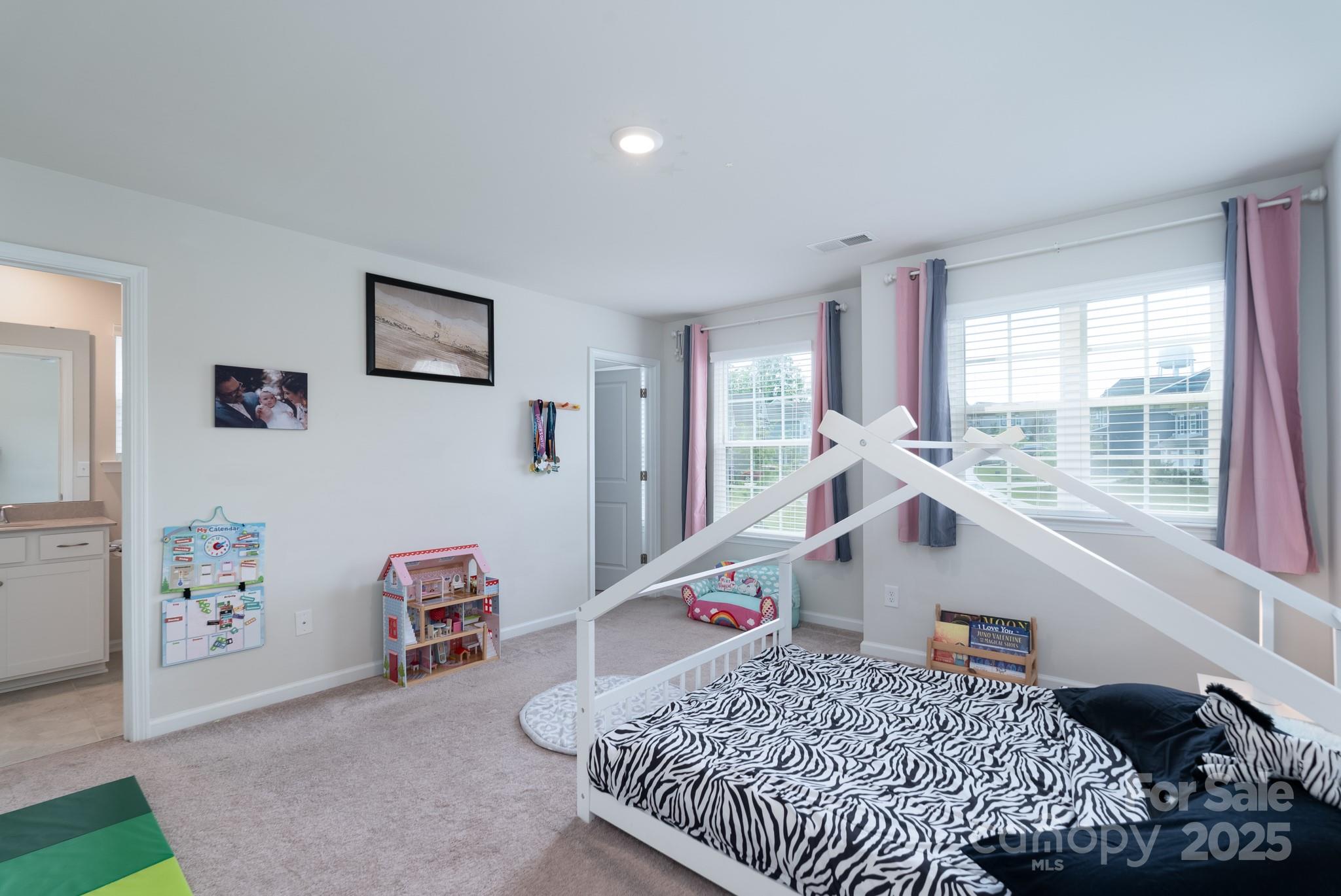 1782 Wildwood Terrace Trail Tega Cay, SC 29708 - Photo 18 of 47 a living room with furniture and a window