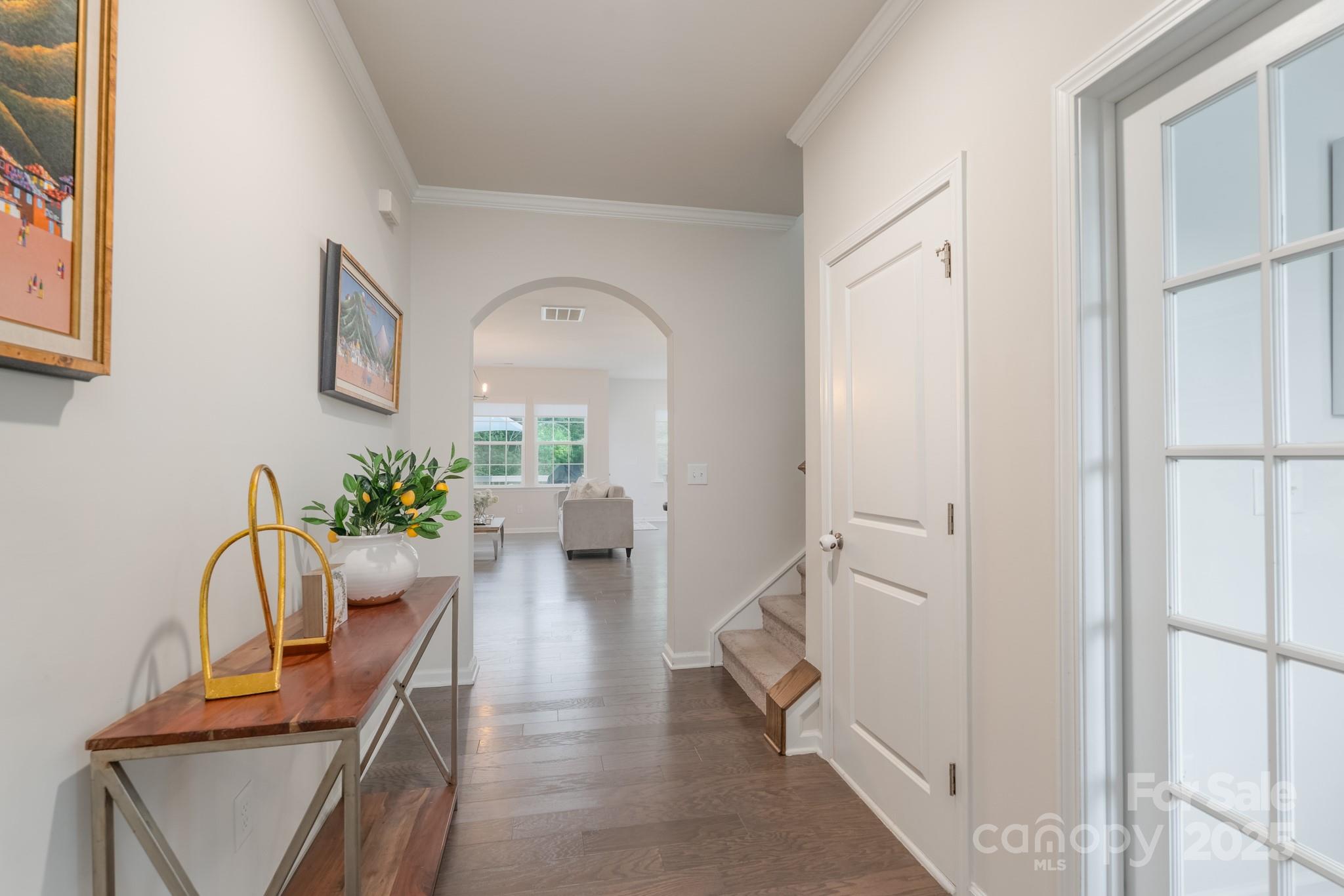1782 Wildwood Terrace Trail Tega Cay, SC 29708 - Photo 3 of 47 a living room with furniture and a potted plant