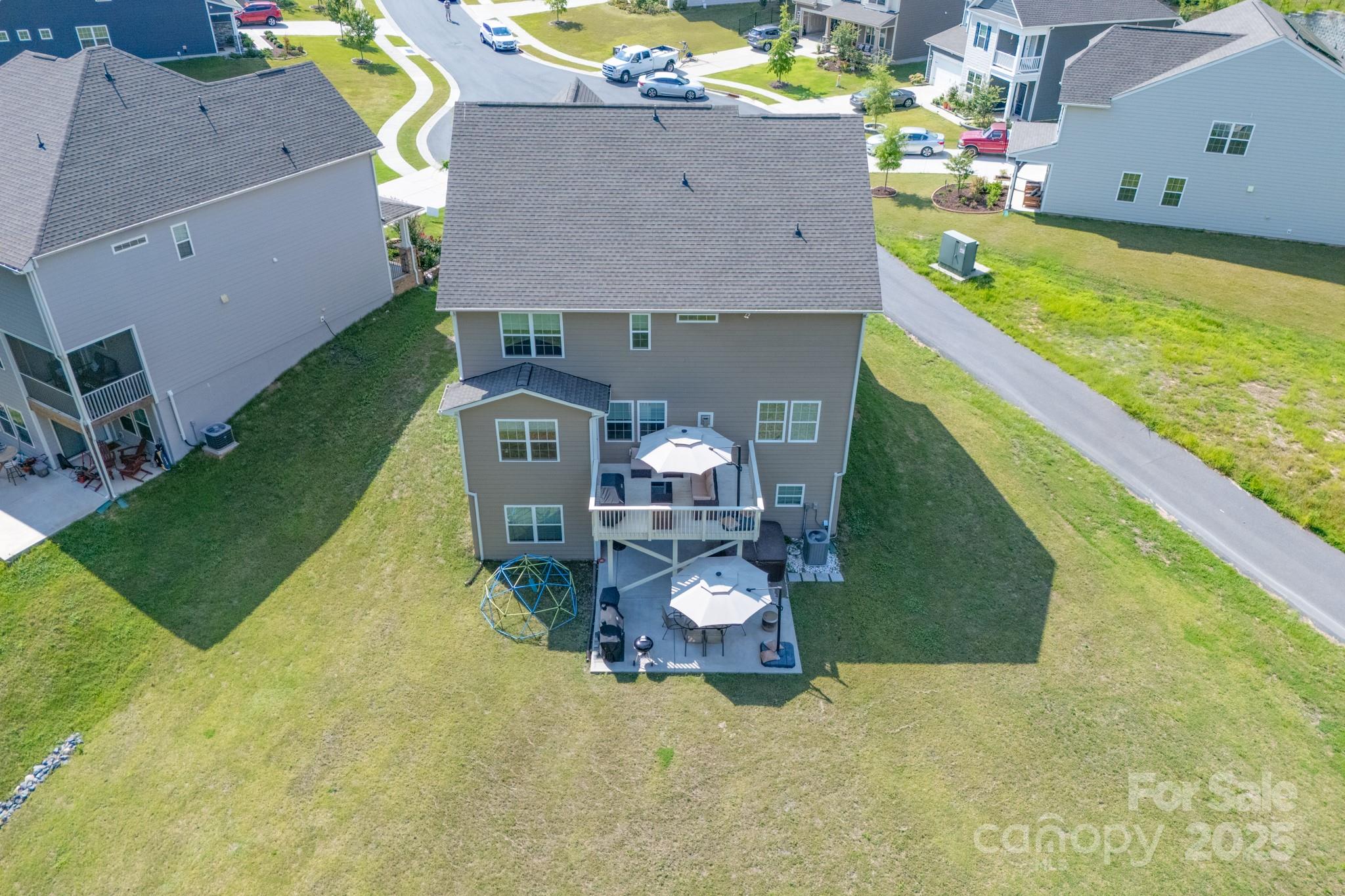 1782 Wildwood Terrace Trail Tega Cay, SC 29708 - Photo 34 of 47 an aerial view of a house with swimming pool