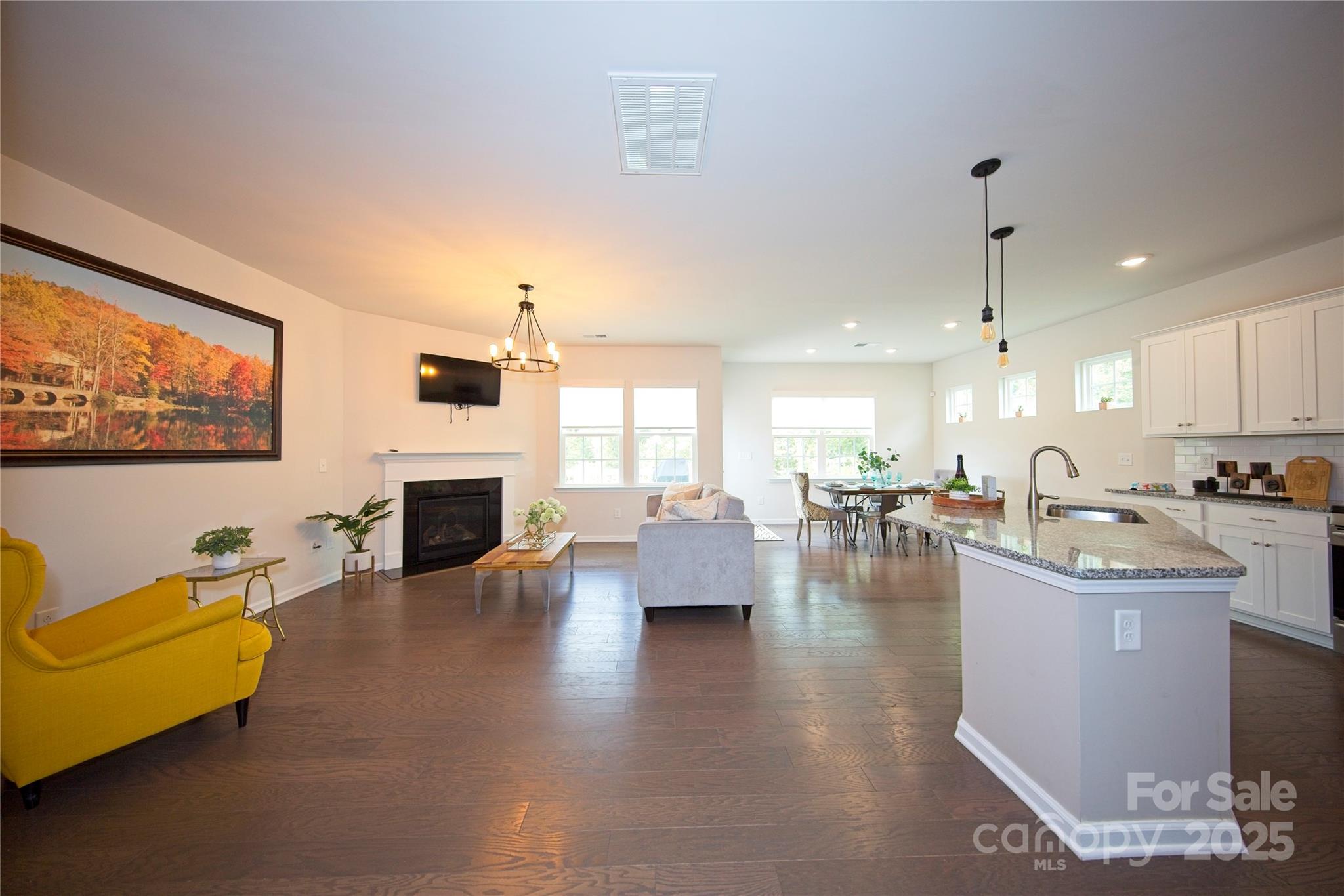 1782 Wildwood Terrace Trail Tega Cay, SC 29708 - Photo 6 of 47 a living room with fireplace furniture and a fireplace