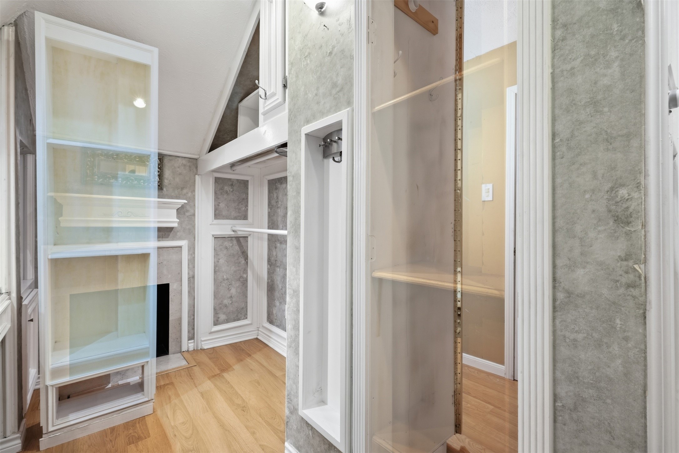 8310 Mentmore Drive Spring, TX 77379 - Photo 32 of 47 Rarely found, the upstairs primary closet offers a dedicated dressing area with remarkable storage capacity.
