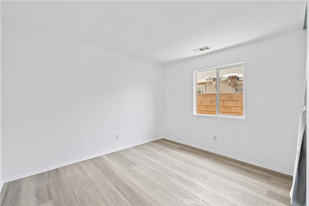 38133 Ranger Drive Palmdale, CA 93552 - Photo 18 of 29 an empty room with a window