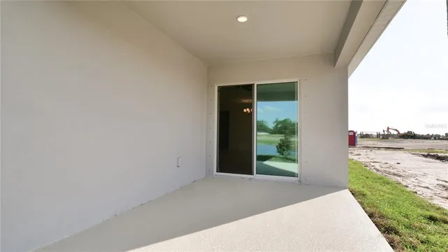 a view of a backyard and a lake view
