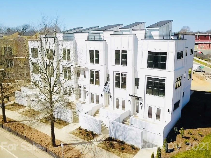 2335 Wesley Village Road, Unit 34 Charlotte, NC 28208 - Photo 2 of 40 a view of a building with a outdoor space