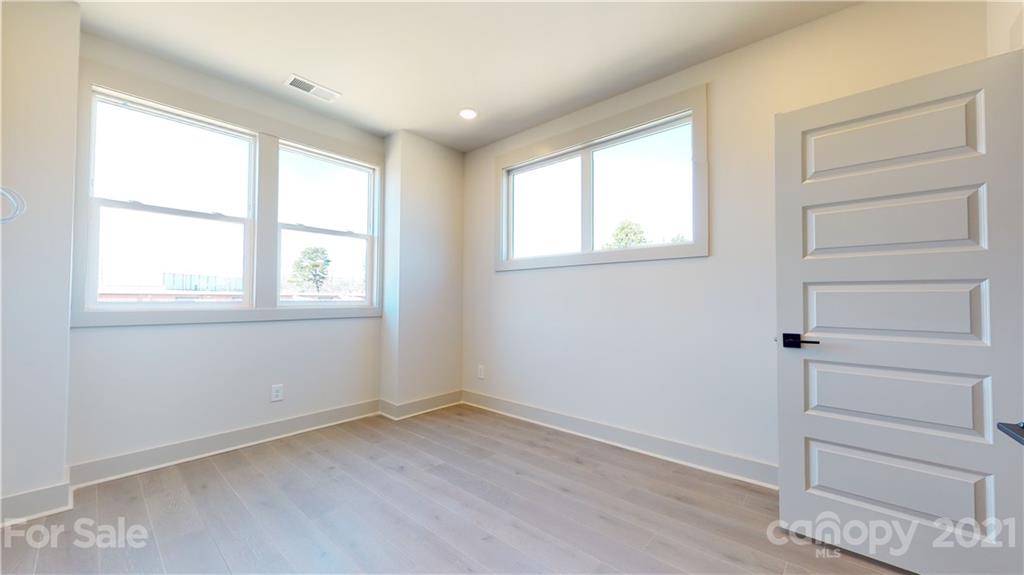 2335 Wesley Village Road, Unit 34 Charlotte, NC 28208 - Photo 17 of 40 an empty room with a window