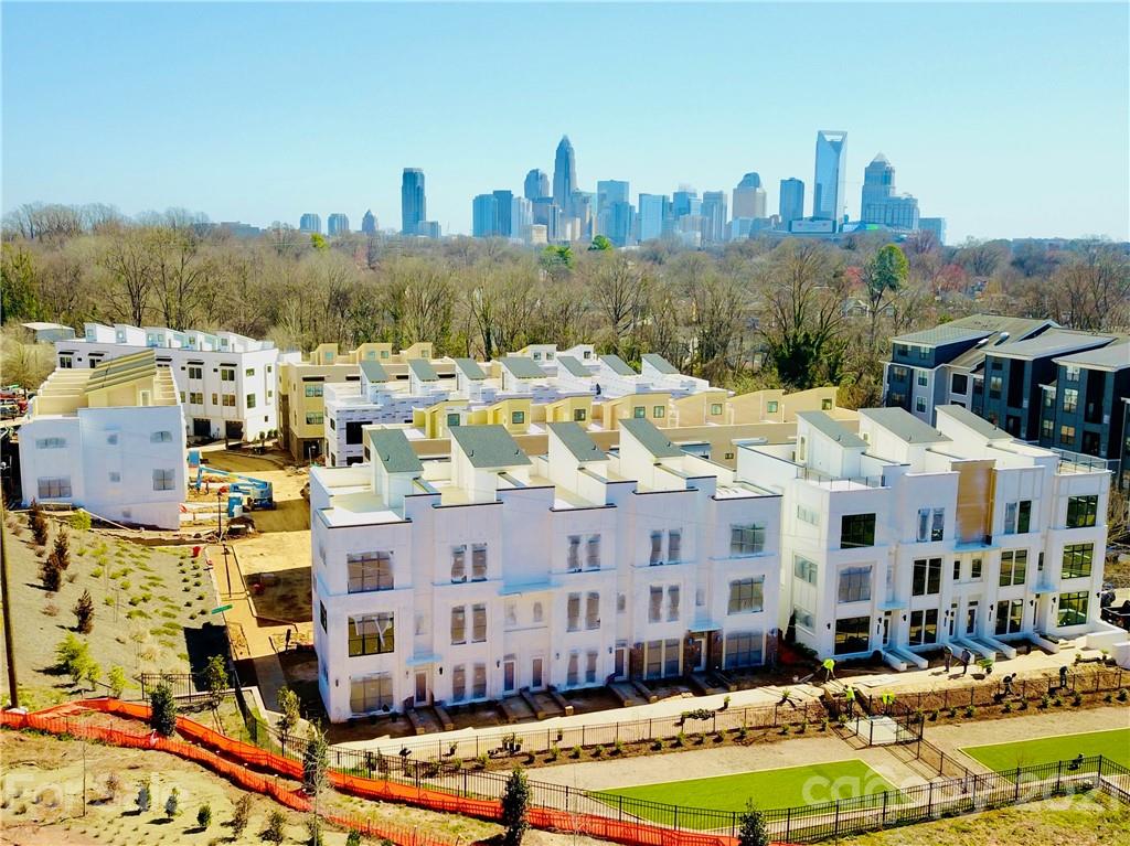 2335 Wesley Village Road, Unit 34 Charlotte, NC 28208 - Photo 3 of 40 a view of a city with tall buildings