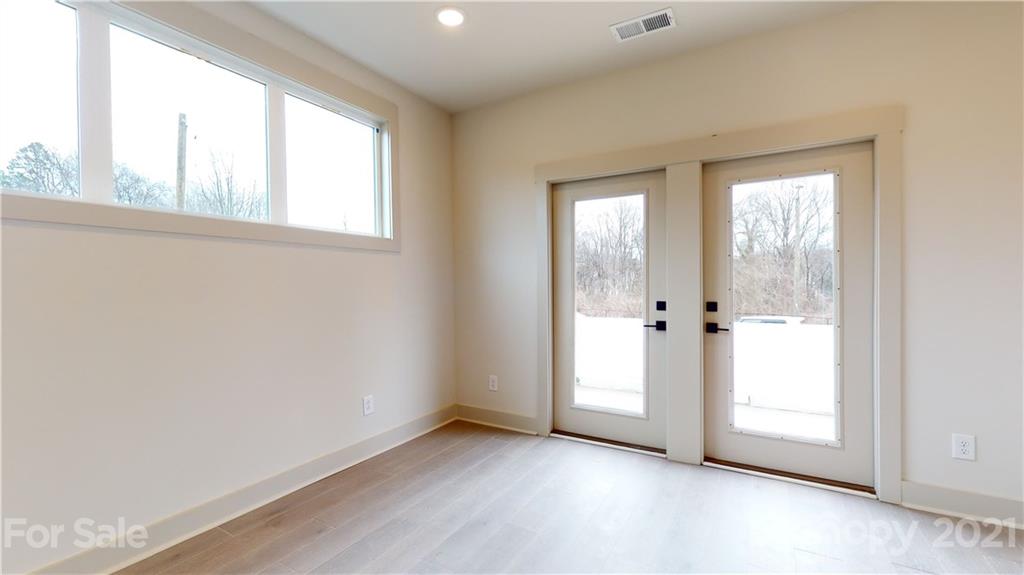 2335 Wesley Village Road, Unit 34 Charlotte, NC 28208 - Photo 24 of 40 a view of an empty room with a window