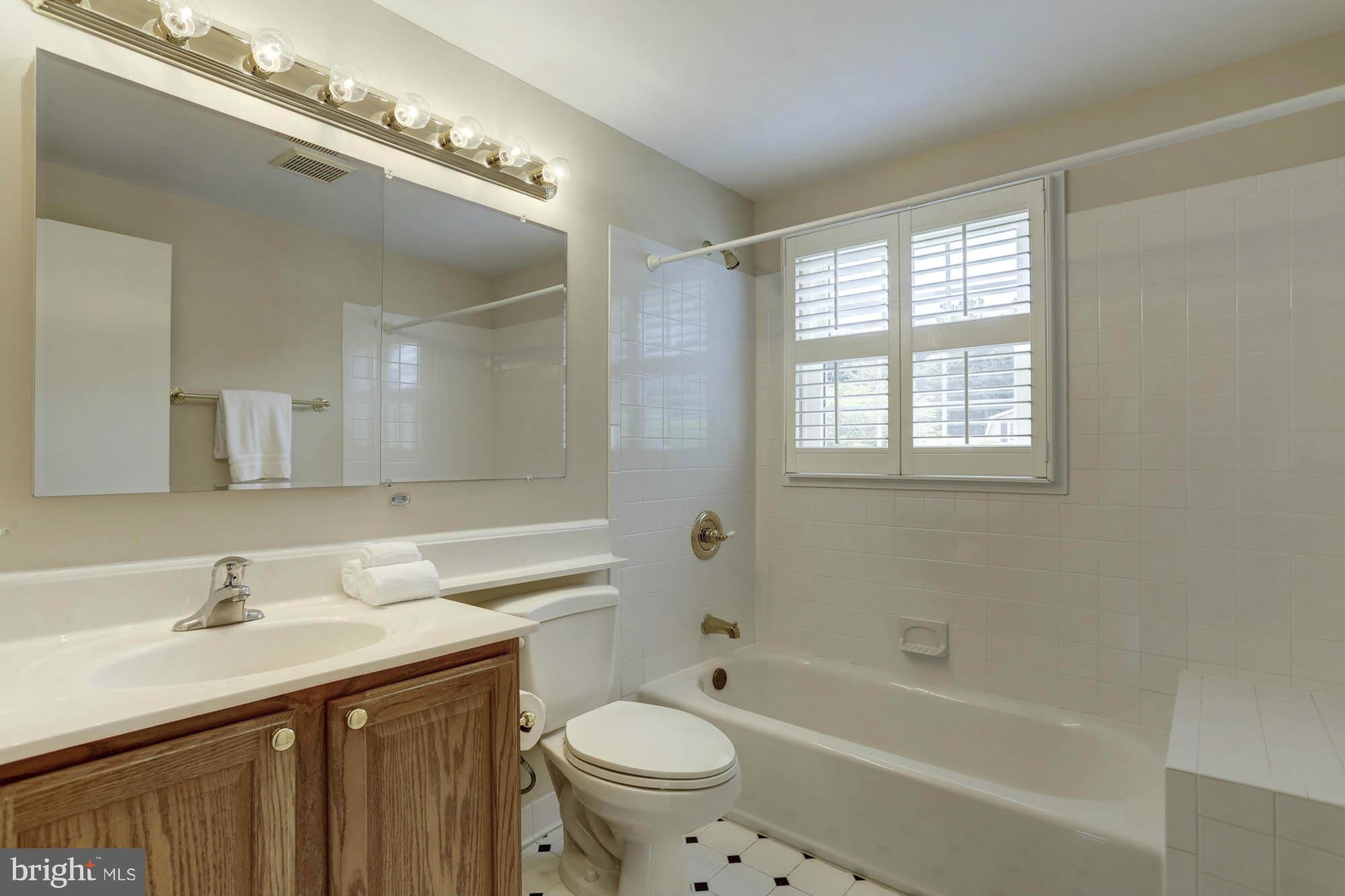 14021 Rippling Brook Drive Silver Spring, MD 20906 - Photo 25 of 26 Remodeled Hall Bathroom