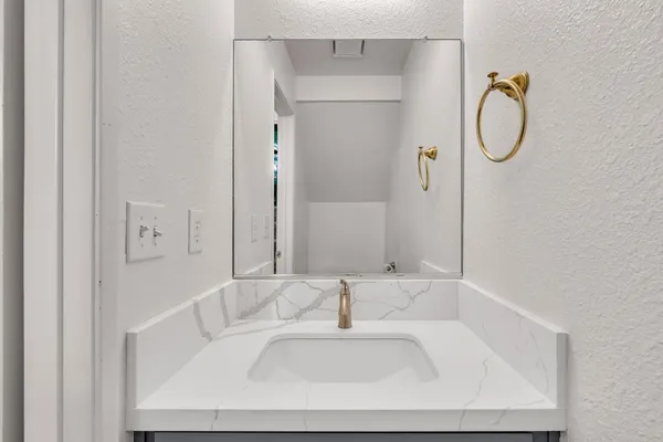 a view of bathroom with toilet