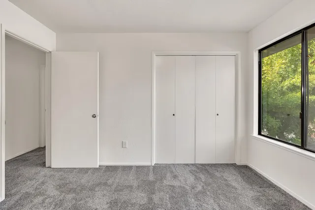 an empty room with windows