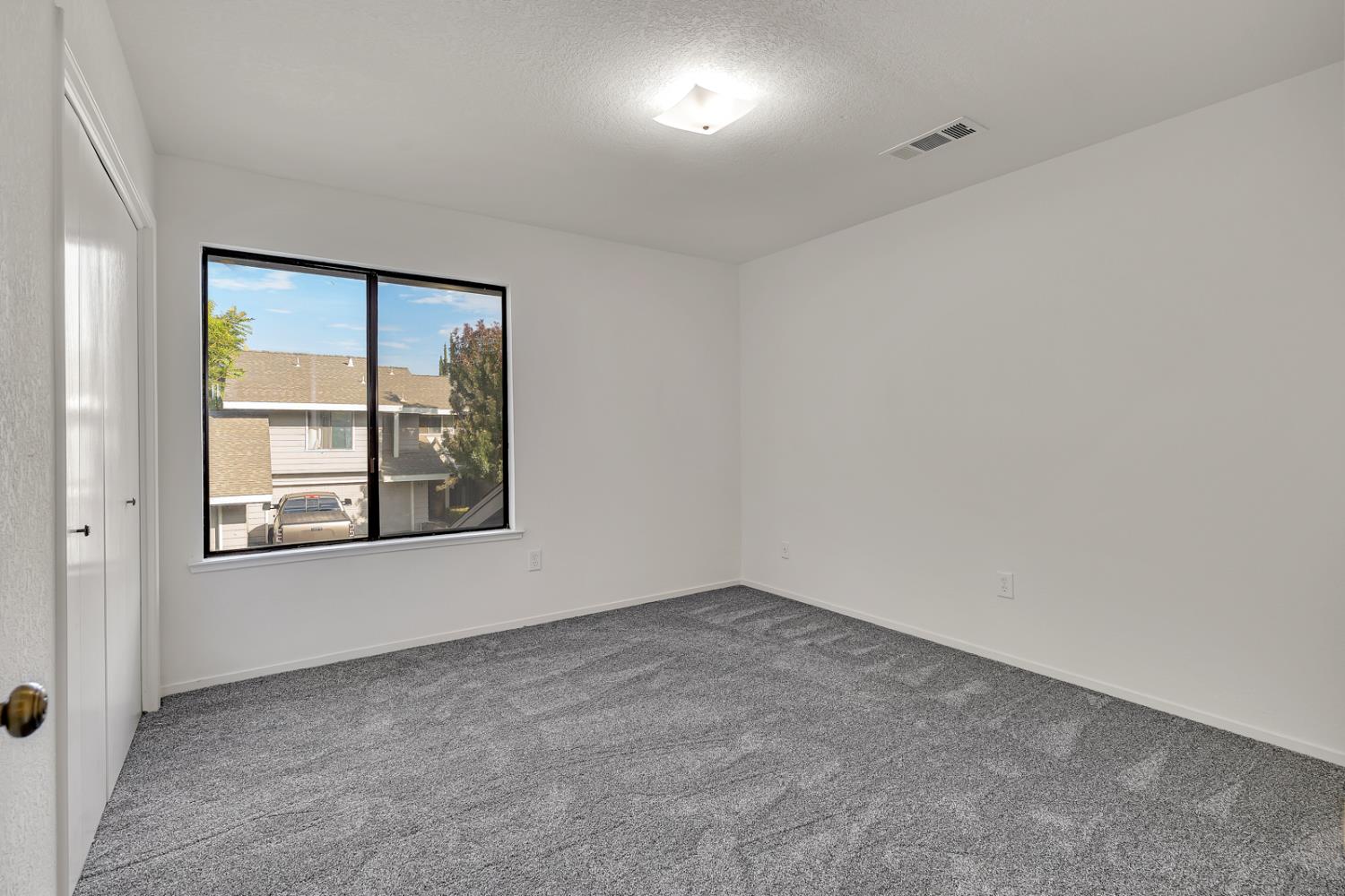 3350 M Street, Unit 74 Merced, CA 95348 - Photo 25 of 53 an empty room with a window