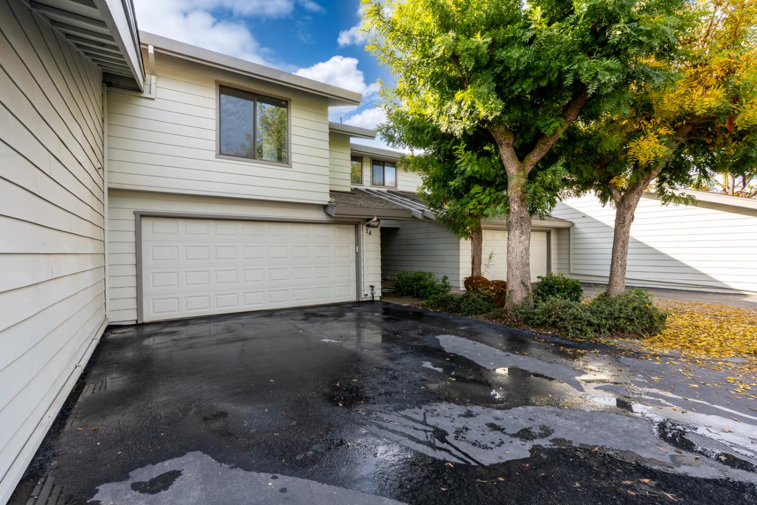 3350 M Street, Unit 74 Merced, CA 95348 - Photo 30 of 53 a front view of a house with garden