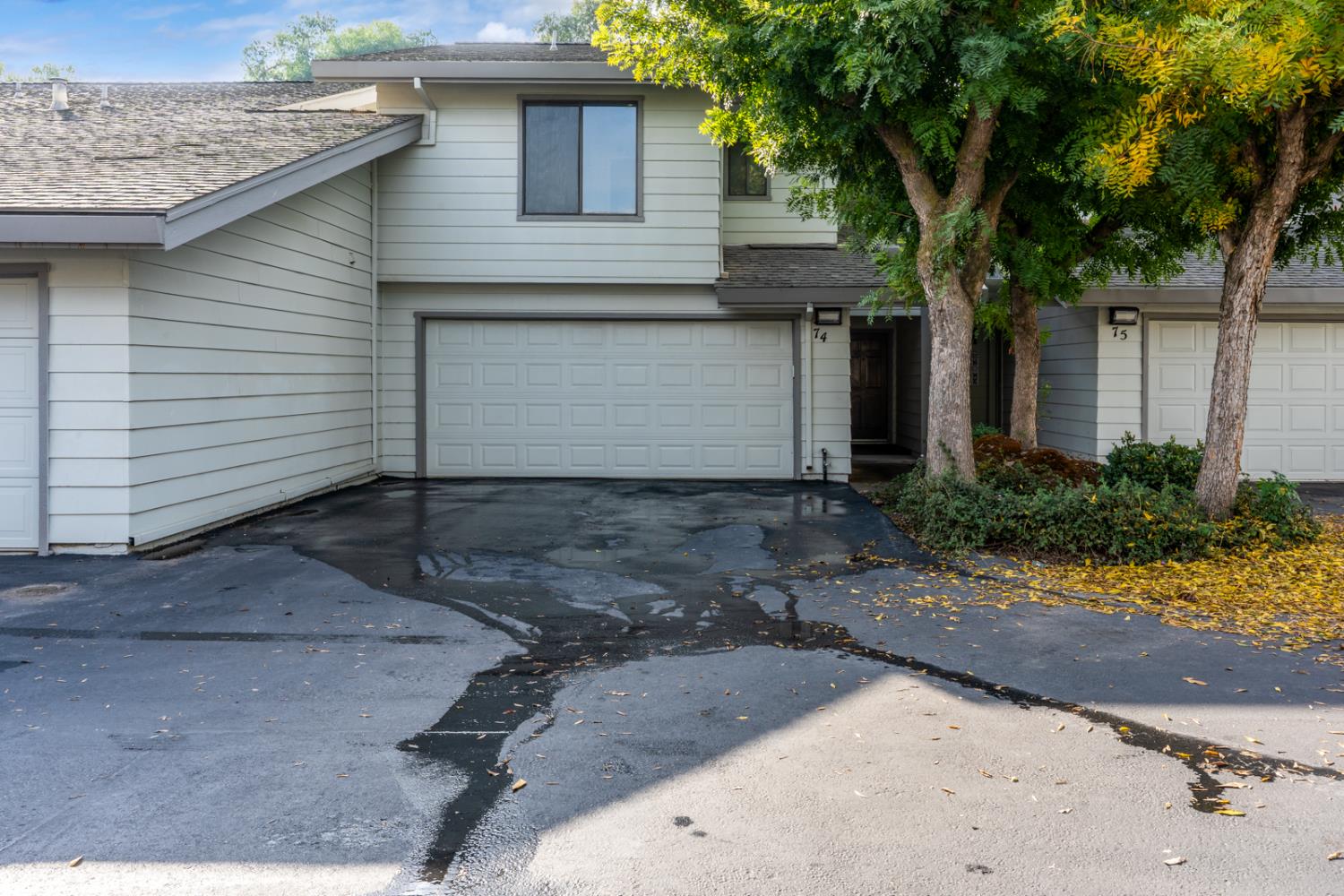 3350 M Street, Unit 74 Merced, CA 95348 - Photo 31 of 53 a front view of a house with a yard