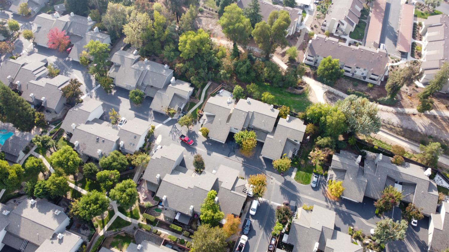 3350 M Street, Unit 74 Merced, CA 95348 - Photo 45 of 53 an aerial view of residential houses with outdoor space