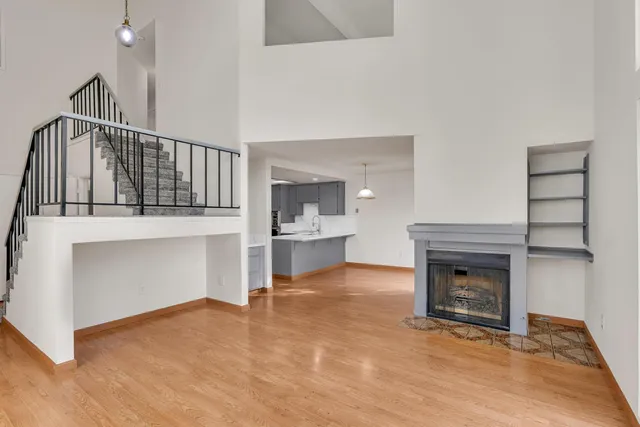 a view of cabinets and wooden floor