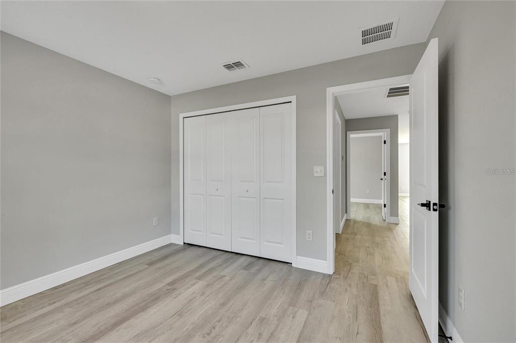 68 Water Track Loop Ocala, FL 34472 - Photo 14 of 20 a view of a room with wooden floor