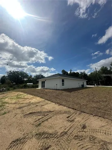 a view of ocean and mountain